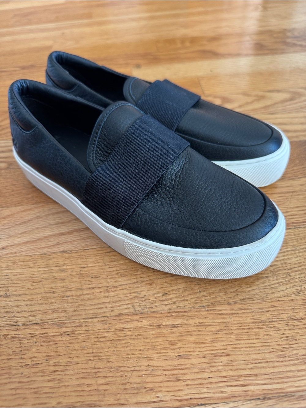 UGG Black Leather Slip-On Loafers with White Platform Sole